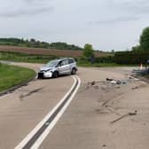 Debris has been left scattered across the road following a crash between two cars in Nottinghamshire.