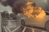 Watch the terrifying moment childen were left in a car that caught fire