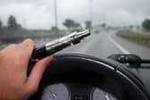 Millions of drivers have admitted to vaping or smoking while driving, which could result in penalty points. (Photo by Michal Fludra/NurPhoto via Getty Images)