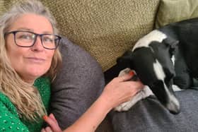 A mum has hailed her dog as her "little lifesaver" after it helped her discover she had breast cancer - by sniffing and pawing at her boob.