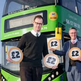 Gedling MP, Tom Randall, left, and NCT’s managing director David Astill pose as the £2 fare cap extension is announced.