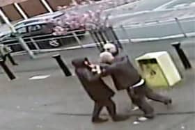 The moment the two brothers kidnapped the child in Hucknall was captured on CCTV. (Photo: Nottinghamshire Police)