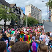 The Nottingham Pride parade began on Lister Gate from 10am with a long queue stretching down the street towards Broadmarsh in a colourful display of rainbows, transgender Pride flags and signs. 