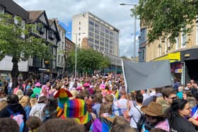 The Nottingham Pride parade began on Lister Gate from 10am with a long queue stretching down the street towards Broadmarsh in a colourful display of rainbows, transgender Pride flags and signs. 