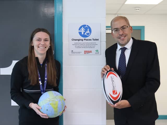 Cllr Jonathan Wheeler and Nottinghamshire FA’s Michelle Marshall outside the new toilet. (Photo: Rushcliffe Borough Council)