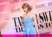 Taylor Swift has announced The Eras Tour concert film will be available to watch from home.
