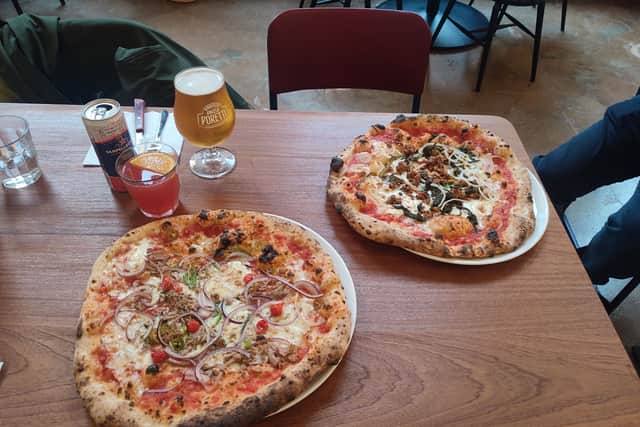 We ordered two pizzas, Salsiccia (left) and Tonno (right) | Image Ria Ghei