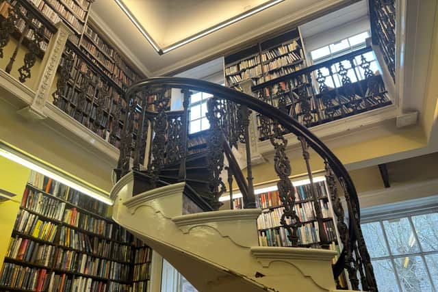 The stunning spiral staircase adds to the library's character 