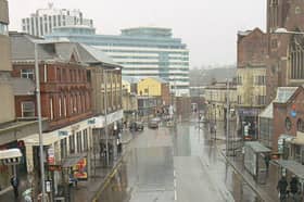 Nottingham in the rain. View eastwards along Lower Parliament Street from the Victoria Centre footbridge