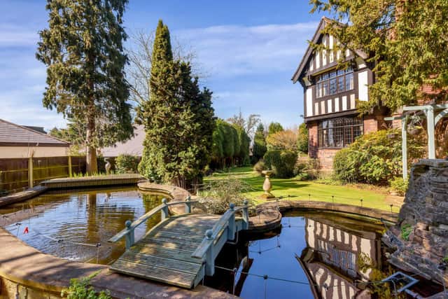 We're in love with this property's magical garden (especially the little bridge over the pond!) 