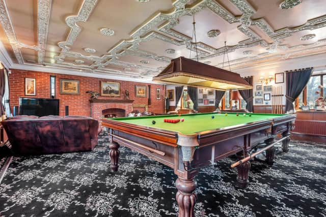 One of this property's best features in an epic games room large enough to fit a full-size pool table 