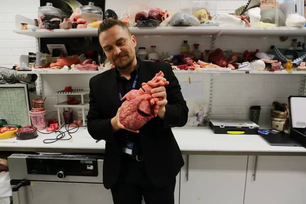 Richard Arm marvels at a replica heart in the NTU lab 