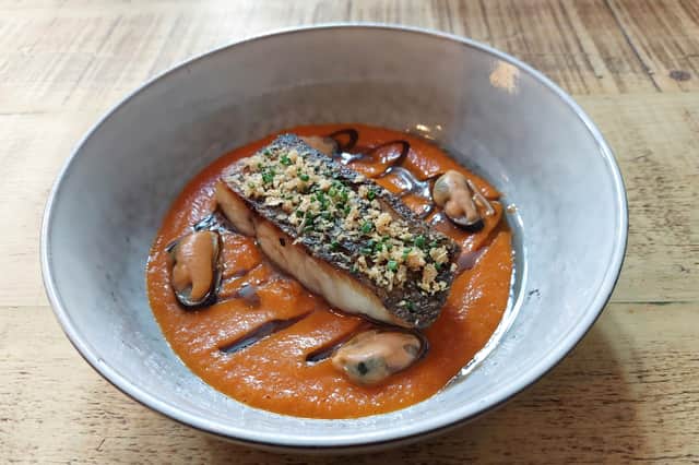 Pan-fried stone bass came nestled in bouillabaisse sauce that I could eat bowls of and never get bored | Photo Ria Ghei