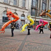 Brightly coloured dragons took to the streets of Nottingham delighting locals