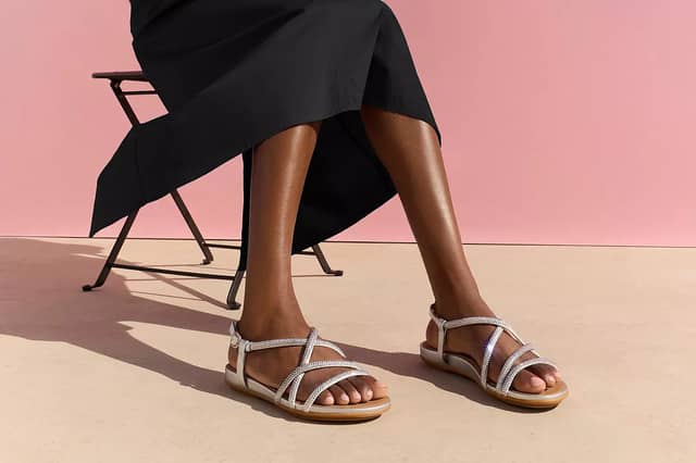 The FitFlop Gracie Crystal Strappy Back-Strap Sandals became my go-to holiday shoes thanks to their comfort and stylish design. Photo posed by model.