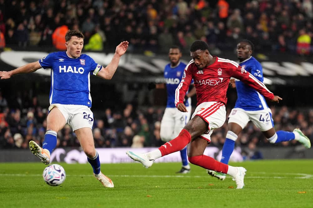  Nottingham Forest's Callum Hudson-Odoi takes a shot on goal while being challenged by Ipswich Town defender Dara O'Shea  