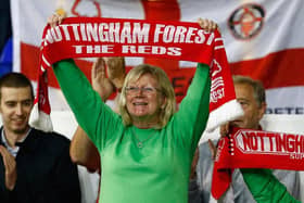 Forest fans wear green Brian Clough jumpers to mark 10 years since his death during the Capital One Cup third round match between Tottenham Hotspur and Nottingham Forest at White Hart Lane on September 24, 2014.
