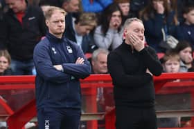 Tait and Cooper look on as Forest lose 0-2 to Manchester United 