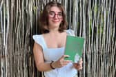 Meg Elizabeth with her new book.